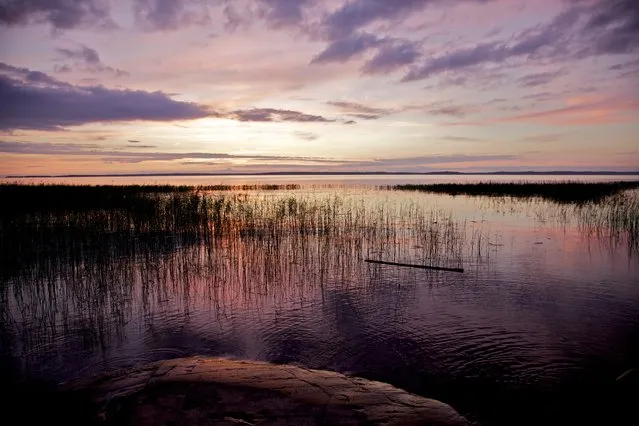 “Vänern Sunset”. I know sunsets are a cliche, but I love this picture, which is not color corrected. The colors that night was magical stretching from deep purple to pink, reflected in the lake of Vänern, the third larges lake in Europe. Location: Mariestad, Vänern, Sweden. (Photo and caption by Harald Sandø/National Geographic Traveler Photo Contest)