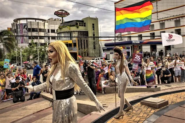 Drag queens Lumina Klum and Mrs. Tan perform as activists take part in a protest to kick off Pride month on June 02, 2023 in Quezon city, Metro Manila, Philippines. Twenty-three years after the first anti-discrimination bill based on sexual orientation and gender identity was introduced by lawmakers, the Philippines has yet to enact it into law. The SOGIE (Sеxual Orientation or Gender Identity or Expression) Equality Bill is considered one of the slowest moving pieces of legislation in the country's history. (Photo by Ezra Acayan/Getty Images)