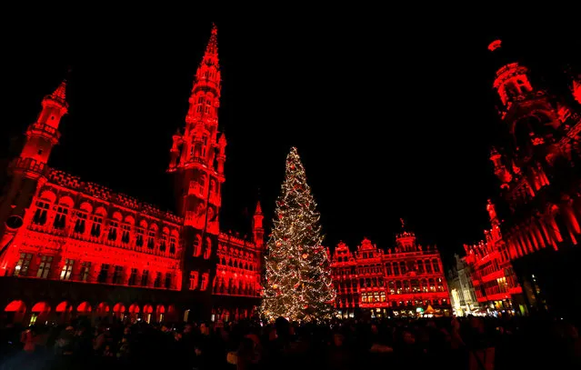 Brussels' Grand Place is illuminated during a light show as part as the Christmas “Winter Wonders” (Plaisirs d'Hiver, Winter Pret) festivities, including a Christmas market and other events in central Brussels, Belgium, November 25, 2016. (Photo by Yves Herman/Reuters)