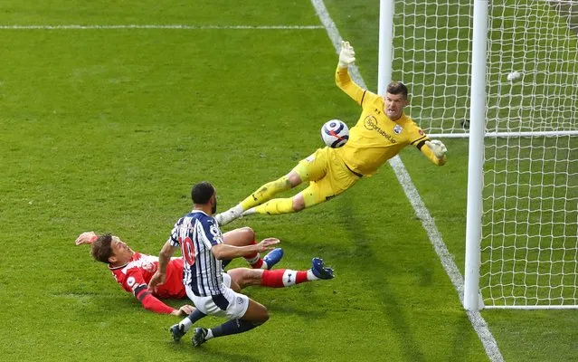 Matt Phillips (front-C) of West Bromwich scores the 2-0 leading during the English Premier League match between West Bromwich Albion and Southampton in West Bromwich, Britain, 12 April 2021. (Photo by Michael Steele/EPA/EFE)