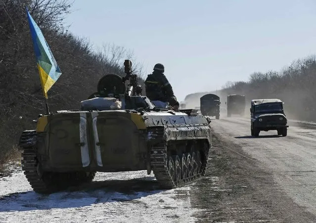 Ukrainian servicemen are seen near Artemivsk, February 18, 2015. (Photo by Gleb Garanich/Reuters)