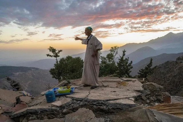 63-year-old Ahmed Hafidi (L) shows his earthquake-destroyed guest house in the Atlas Mountains range in Al Haouz province  on September 14, 2023. The magnitude 6.8 earthquake – Morocco's strongest ever – has killed nearly 3,000 people and injured more than 5,600 since it hit on September 8 in Al-Haouz province, south of tourist hub Marrakesh. (Photo by Bulent Kilic/AFP Photo)
