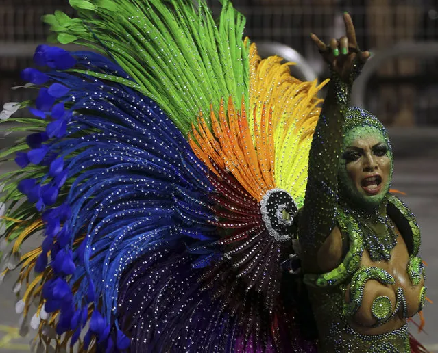 A reveller parades for the Mocidade Alegre samba school during the carnival in Sao Paulo, Brazil, February 7, 2016. (Photo by Paulo Whitaker/Reuters)