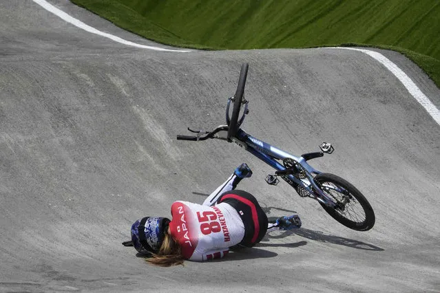 Sae Hatakeyama of Japan crashes in the women's BMX Racing quarterfinals at the 2020 Summer Olympics, Thursday, July 29, 2021, in Tokyo, Japan. (Photo by Ben Curtis/AP Photo)