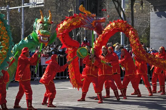 Chinese dragon dancers perform at the Dongyue Temple on the first day of the Chinese Lunar New Year in Beijing, Saturday, February 10, 2024. (Photo by Andy Wong/AP Photo)