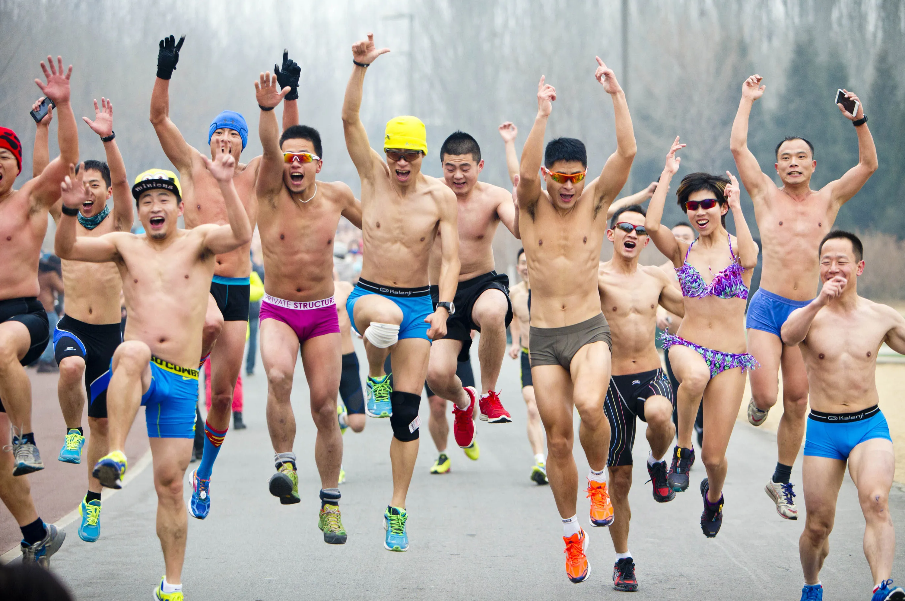 Next picture →. People take part in the annual 3.5 km undie run at Olympic ...