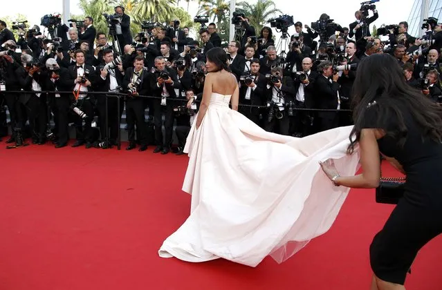 Actress Leila Bekhti poses on the red carpet as she arrives for the opening ceremony and the screening of the film “La tete haute” out of competition during the 68th Cannes Film Festival in Cannes, southern France, May 13, 2015. (Photo by Eric Gaillard/Reuters)