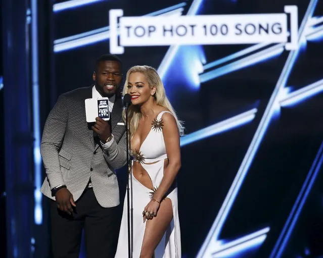 Rapper 50 Cent and singer Rita Ora present the Top Hot 100 Song award during the 2015 Billboard Music Awards in Las Vegas, Nevada May 17, 2015. (Photo by Mario Anzuoni/Reuters)