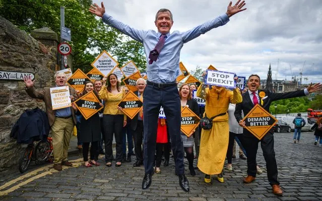 Scottish Liberal Democrat leader Willie Rennie does a star jump as he attends a rally, with activists and campaigners on May 22, 2019 in Edinburgh,Scotland. The Lib Dem leader was on a day long UK tour as he told supporters that the Liberal Democrats were set to make gains, including in Scotland, as the strongest party of Remain in the UK. (Photo by Jeff J. Mitchell/Getty Images)