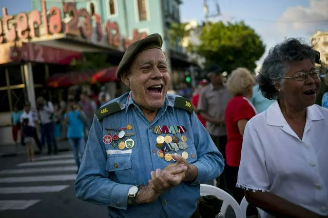In this April 16, 2019 photo, Edwin Moore, a veteran of the U.S. Bay of Pigs invasion, sings during an event commemorating the 58th anniversary of Fidel Castro's declaration that his revolution in the 1950s was a socialist one, in Havana, Cuba. Reaction to news that the Trump administration plans to tighten sanctions against Cuba prompted worry, defiance and warnings on Tuesday, with Bay of Pigs veterans dismissing U.S. pressure. (Photo by Ramon Espinosa/AP Photo)
