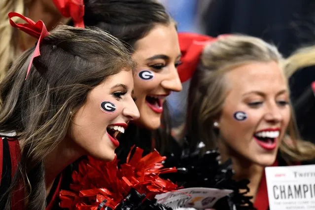 Georgia Bulldogs cheerleaders celebrate at the conclusion of the Alabama Crimson Tide versus the Georgia Bulldogs in the College Football Playoff National Championship, on January 10, 2022, at Lucas Oil Stadium in Indianapolis, IN. (Photo by Michael Allio/Icon Sportswire via Getty Images)