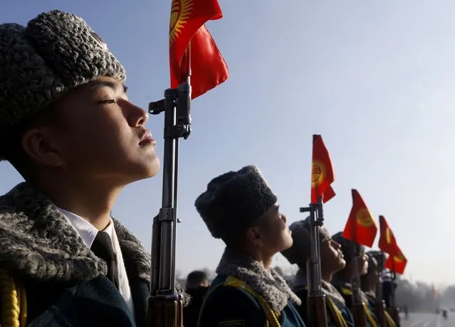 Kyrgyz soldiers during a procession dedicated to the Day of the State Flag on the central Ala-Too Square in the center of Bishkek, Kyrgyzstan, 03 March  2022. The National Flag Day of Kyrgyzstan is celebrated annually on 03 March. The holiday was established in order to educate citizens in the spirit of patriotism and respect for the state symbols of the country. Today is the 30th anniversary of the state flag of Kyrgyzstan. (Photo by Igor Kovalenko/EPA/EFE)