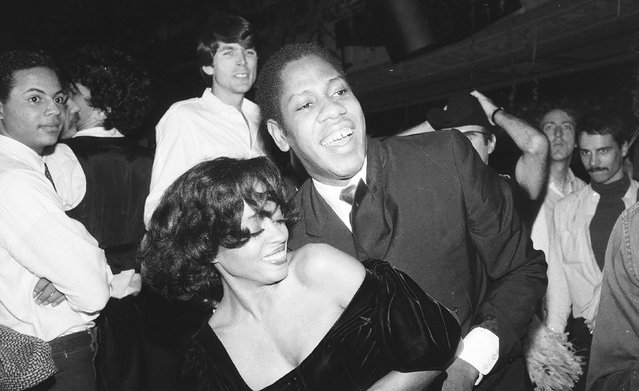 American singer Diana Ross and American fashion journalist Andre Leon Talley dancing at Studio 54, c 1979 in New York City. (Photo by Sonia Moskowitz/Getty Images)