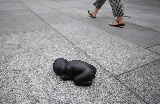 Iron Baby, a sculpture that is part of Antony Gormley’s exhibition at the Royal Academy of Arts in London, England on September 14, 2019. (Photo by Toby Melville/Reuters)