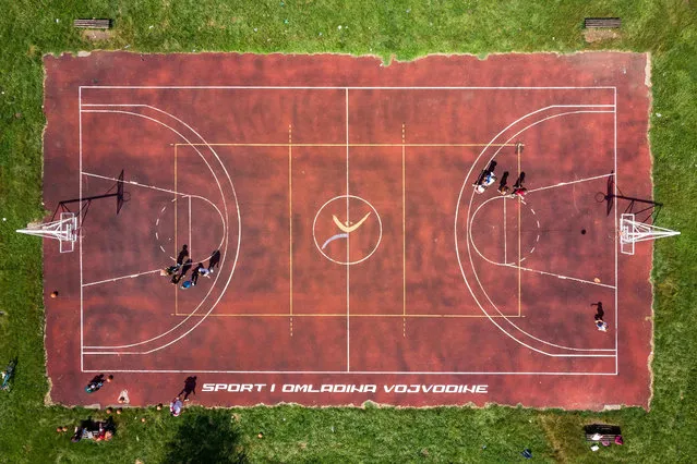 This aerial picture taken on June 25, 2019 shows a view of the basketball court where Nikola Jokic, the 24-year-old Serbian basketball player who plays for the NBA's Denver Nuggets, started playing basketball in his hometown of Sombor. Serbs are hoping that their homegrown hero Jokic – who did not play in the 2014 World Cup – can fire the country at the latest edition, which starts on August 31 in China. Beaten in the final last time, Serbia are again among the favourites to challenge holders the United States. (Photo by Andrej Isakovic/AFP Photo)