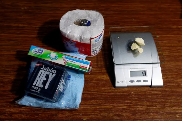 Cleaning products lie next to coca paste worth $18,000 Colombian pesos at a local store in Guyabero Region, Guaviare, Colombia, May 24, 2016. (Photo by John Vizcaino/Reuters)