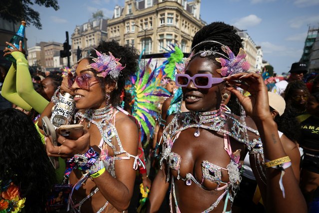 Revellers participate in the Notting Hill Carnival parade, in London, Britain on August 26, 2024. (Photo by Hollie Adams/Reuters)