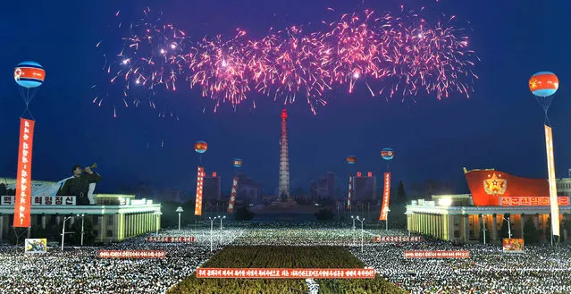 Army personnel and people gather at Kim Il Sung Square in Pyongyang July 6, 2017 to celebrate the successful test-launch of intercontinental ballistic rocket Hwasong-14. in this photo released by North Korea's Korean Central News Agency (KCNA) in Pyongyang July 7, 2017. (Photo by Reuters/KCNA)