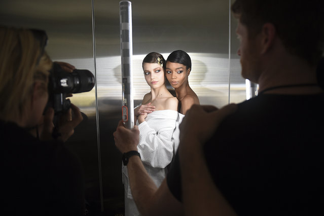 Models prepare backstage at the Tom Ford show at Milk Studios during NYFW Fall/Winter 2020 on Friday, February 7, 2020, in Los Angeles. (Photo by Jordan Strauss/Invision/AP Photo)