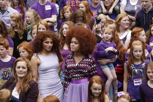 People with red hair from all over the world gather on “Roodharigendag” (Redhead Day) in Breda. (Photo by Arie Kievit/EPA)