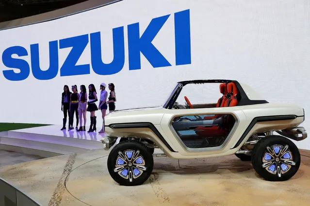 Models present Suzuki Motor's EV e-Survivor concept during media preview of the 45th Tokyo Motor Show in Tokyo, Japan on October 25, 2017. (Photo by Kim Kyung-Hoon/Reuters)