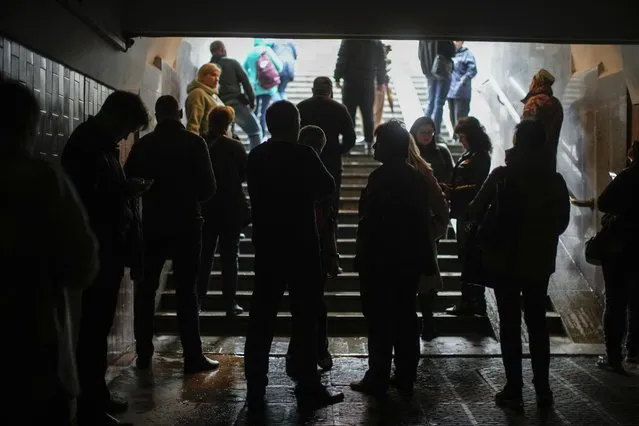 People shelter in a subway station after a Russian shelling in Kharkiv, Ukraine, Monday, October 10, 2022. (Photo by Francisco Seco/AP Photo)