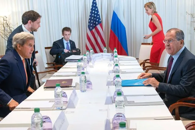 US Secretary of State John Kerry (L) and Russian Foreign Minister Sergei Lavrov (R) met on August 26, 2016 in Geneva for an expected push towards resuming peace talks for war-ravaged Syria. Successive rounds of international negotiations have failed to end a conflict which has killed more than 290,000 people and forced millions from their homes. (Photo by Martial Trezzini/AFP Photo)