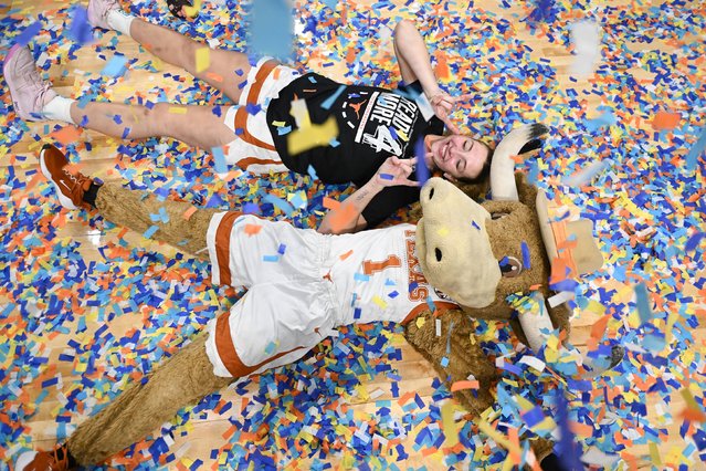 Taylor Jones, a basketball player for the University of Texas, celebrates with Hook ’Em the mascot on Monday, March 31, 2025, after the Longhorns defeated TCU to clinch a spot in the Final Four. (Photo by Elaina Eichorn/NCAA Photos/Getty Images)