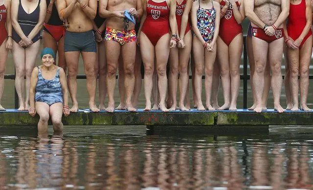 Swimmers prepare to take part in the annual Christmas Day Peter Pan Cup handicap race in the Serpentine River, in Hyde Park, London, December 25, 2015. (Photo by Andrew Winning/Reuters)