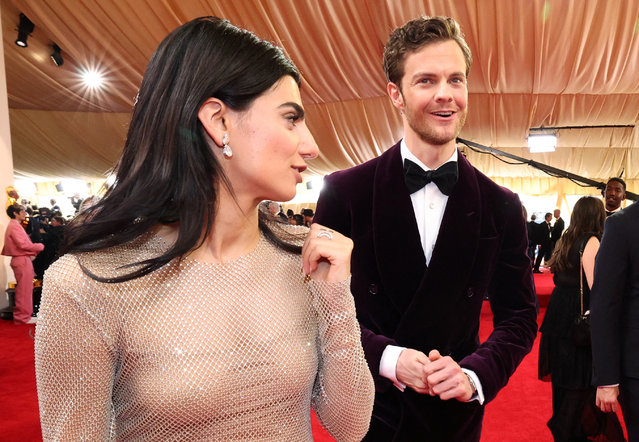Actors Jack Quaid and Claudia Doumit  pose on the red carpet during the Oscars arrivals at the 96th Academy Awards in Hollywood, Los Angeles, California, U.S., March 10, 2024. (Photo by Mario Anzuoni/Reuters)