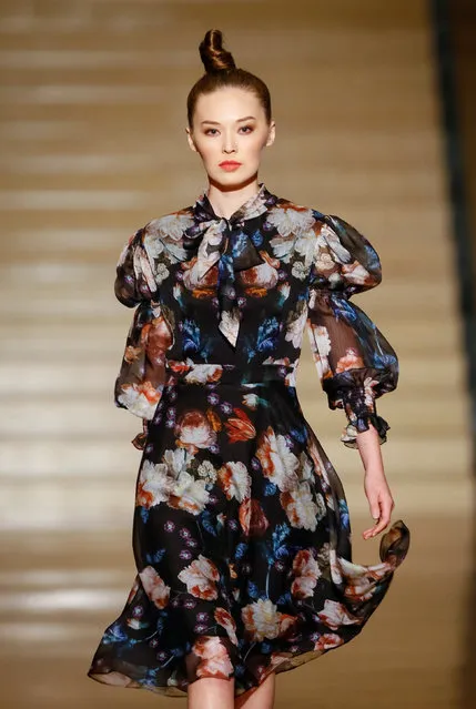 A model presents a creation by Kazakhstan's designer Dinara Satzhan during Kazakhstan Fashion Week at National Academical Theater of Opera and Ballet in Almaty, Kazakhstan April 11, 2018. (Photo by Shamil Zhumatov/Reuters)