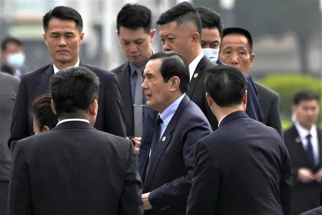 Former Taiwan President Ma Ying-jeou, center, arrives at the Nanjing Massacre Memorial Hall in Nanjing in eastern China's Jiangsu Province, Wednesday, March 29, 2023. Ma began a 12-day tour of China with a symbolism-laden visit to the mausoleum where a founding figure revered in both China and Taiwan is entombed. (Photo by Ng Han Guan/AP Photo)