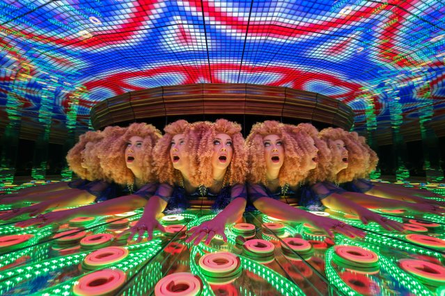The singer, actor and cabaret act Miss Frisky explores the kaleidoscope at the Camera Obscura & World of Illusions in Edinburgh during the Edinburgh Fringe Festival on Wednesday, August 13, 2025. (Photo by Jeff J. Mitchell/Getty Images)