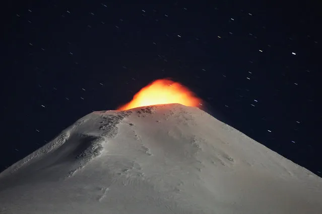 The Villarrica Volcano is seen at night from Pucon town, Chile, August 8, 2019. (Photo by Cristobal Saavedra/Reuters)