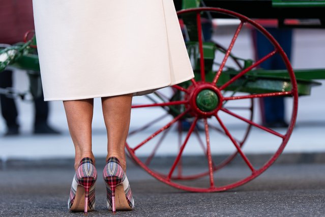 First lady Melania Trump wears Manolo Blahnik pumps while receiving the official 2025 White House Christmas Tree, a white fir from Korson's Tree Farms in Michigan, on the North Portico of the White House, Monday, November 24, 2025, in Washington. (Photo by Julia Demaree Nikhinson/AP Photo)
