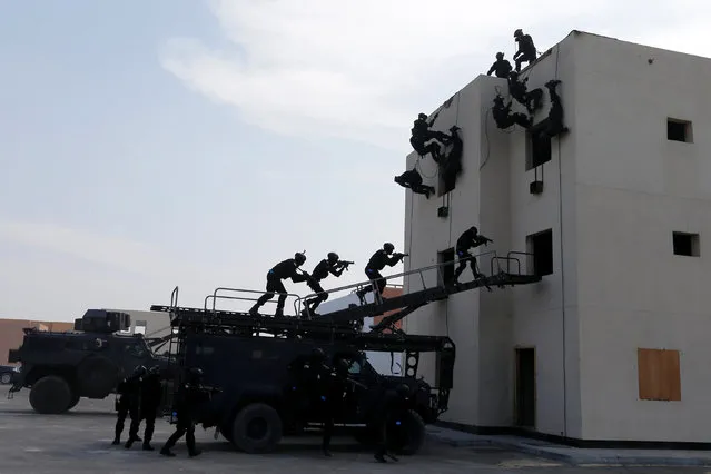 Bahrain Special Forces unit and Omani Tactical & Commando personnel exercise together in their drill during the month-long GCC joint security exercise “Arabian Gulf Security 1” in Manama, Bahrain November 1, 2016. (Photo by Hamad I. Mohammed/Reuters)