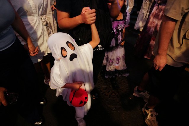 People wear costumes celebrating Halloween at Lan Kwai Fong, a popular nightlife destination in Central, in Hong Kong, China on October 31, 2025. (Photo by Lam Yik/Reuters)