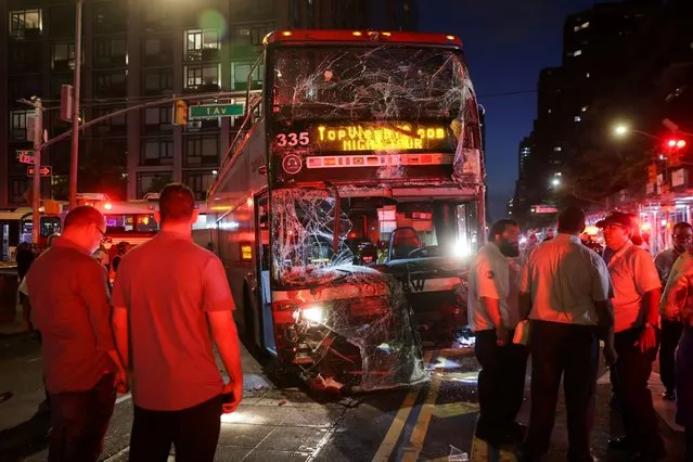 A view of the site of a bus crash between a tourist double decker bus and a city bus in the Manhattan borough of New York City, U.S., July 6, 2023. (Photo by Jeenah Moon/Reuters)