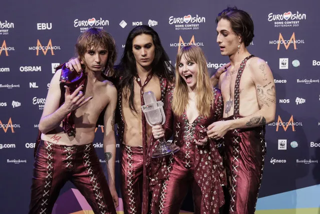 Members of the band Maneskin from Italy Thomas Raggi, from left, Ethan Torchio, Victoria De Angelis and Damiano David pose for photographers with the trophy after winning the Grand Final of the Eurovision Song Contest at Ahoy arena in Rotterdam, Netherlands, Saturday, May 22, 2021. (Photo by Peter Dejong/AP Photo)