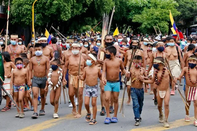 Members of the Bari ethnic group march during a protest against the government of President Ivan Duque for the breaching of territorial agreements, in Cucuta, Colombia, on the border with Venezuela, on May 31, 2021. (Photo by Schneyder Mendoza/AFP Photo)