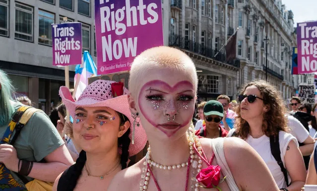 Transgender participants are seen posing for photo during the Trans Pride march in London on July 9, 2022. LGBTQ+ supporters, especially transgender people, gathered in London to participate the annual Trans Pride in response to the injustice that trans+ people are facing in their daily life in all over the world. They took the historic marching route from Hyde Park to Soho Square. (Photo by WIktor Szymanowicz/NurPhoto/Rex Features/Shutterstock)