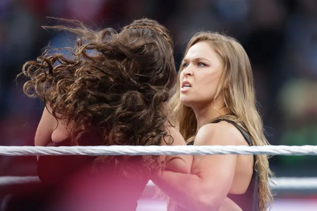 UFC fighter Ronda Rousey makes a surprise appearance at WrestleMania 31 on Sunday, March 29, 2015 at Levi's Stadium in Santa Clara, CA. WrestleMania broke the Levi's Stadium attendance record at 76,976 fans from all 50 states and 40 countries. (Photo by Don Feria/AP Images for WWE)