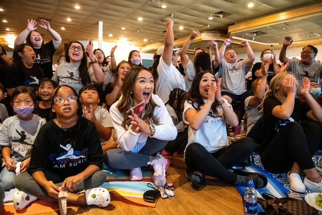 Family and friends react after Sunisa Lee of Team United States won gold in the Women's All-Around Final on day six of the Tokyo 2020 Olympic Games at a watch party on July 29, 2021 in Oakdale, Minnesota. (Photo by Stephen Maturen/Getty Images)