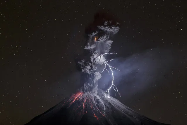 “The Power of Nature”. Nature, third prize singles. Sergio Velasco, Mexico. Location: Colima, Mexico. Colima Volcano in Mexico shows a powerful night explosion with lightning, ballystics and some incandescent rockfalls. Photo taken on December 13 at 22:24 hours, 12.5 km away from the crater near a lagoon named Carrizalillos on Comala municipality in the state of Colima. Colima Volcano had a period of enormous activity on july of 2015, at least 700 inhabitants were evacuated from their settlements. (Photo by Sergio Velasco/World Press Photo Contest)