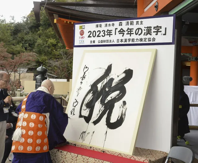 The kanji character “zei”, or taxes is displayed as the kanji letter of this year, at Kiyomizu temple in Kyoto, Japan, Tuesday, December 12, 2023. The kanji character “zei”, or taxes, was chosen as one that best represents 2023 amid growing speculation of a future tax increase to fund Japan’s ongoing drastic military buildup. The top Buddhist monk at the Kiyomizu Temple in Kyoto, using a brush, wrote the letter on the temple balcony during Tuesday’s closely watched annual event. (Photo by Kyodo News via AP Photo)