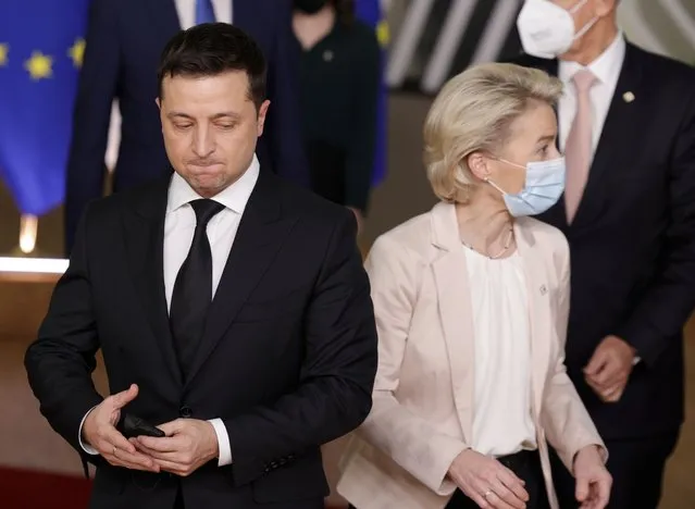 European Commission President Ursula von der Leyen, right, and Ukraine's President Volodymyr Zelenskyy, left, during a group photo of EU leaders and Eastern Partnership countries at an Eastern Partnership Summit in Brussels, Wednesday, December 15, 2021. European Union leaders meet with partner nations on its eastern borders on Wednesday, with the Russian military buildup on Ukraine's border as the main point of focus. (Photo by Olivier Matthys/AP Photo)