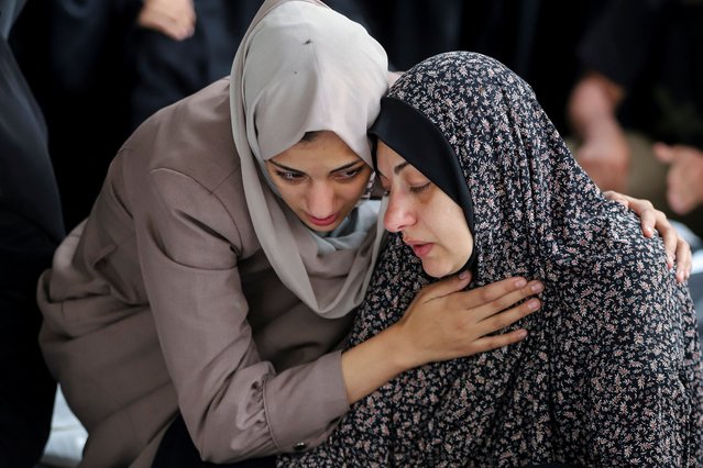 Mourners react during the funeral of Palestinians killed in Israeli strikes, amid the ongoing conflict between Israel and the Palestinian Islamist group Hamas, in Rafah, in the southern Gaza Strip, on April 29, 2024. (Photo by Hatem Khaled/Reuters)