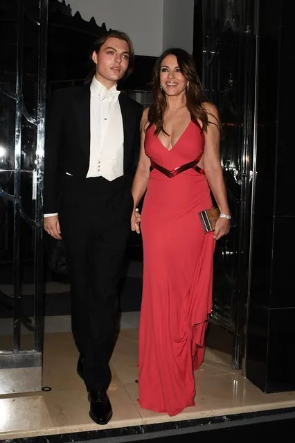 English actress Elizabeth Hurley and son Damian Hurley seen attending Dame Joan Collins 88th birthday and 20th wedding anniversary celebration at Claridges Hotel on February 17, 2022 in London, England. (Photo by Raw Image LTD/Goff Photos)