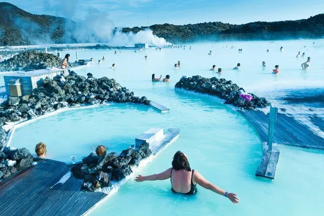 Blue Lagoon. Blue Lagoon people enjoying their time in the legendary Blue Lagoon outside of Reykjavik in Iceland. (Photo by Slawek Kozdras/National Geographic Travel Photographer of the Year Contest)