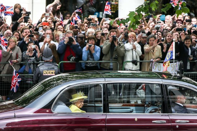 Britain's Queen Elizabeth II and Britain's Prince Philip, Duke of Edinburgh arrive in a state car for a national service of thanksgiving for the Queen's 90th birthday at St Paul's Cathedral in London on June 10, 2016, which is also the Duke of Edinburgh's 95th birthday. Britain started a weekend of events to celebrate the Queen's 90th birthday. The Queen and the Duke of Edinburgh along with other members of the royal family will attend a national service of thanksgiving at St Paul's Cathedral on June 10, which is also the Duke of Edinburgh's 95th birthday. (Photo by Alex Lentati/AFP Photo)
